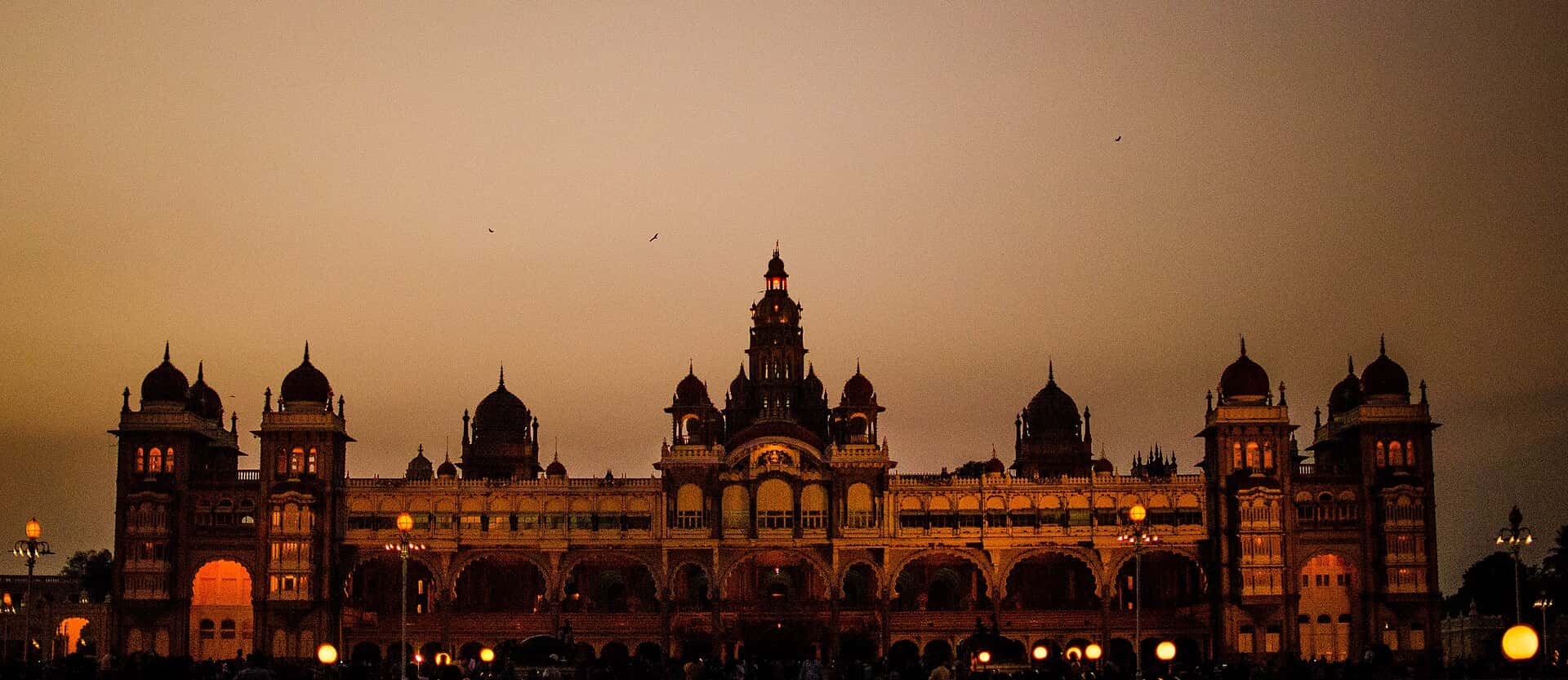 Mysore Palace illuminated at dusk in Mysuru, Karnataka